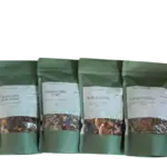 A set of natural autumn teas — Currant & Sea Buckthorn, Raspberry Evening, Spiced Autumn, and Strawberry Hugs.